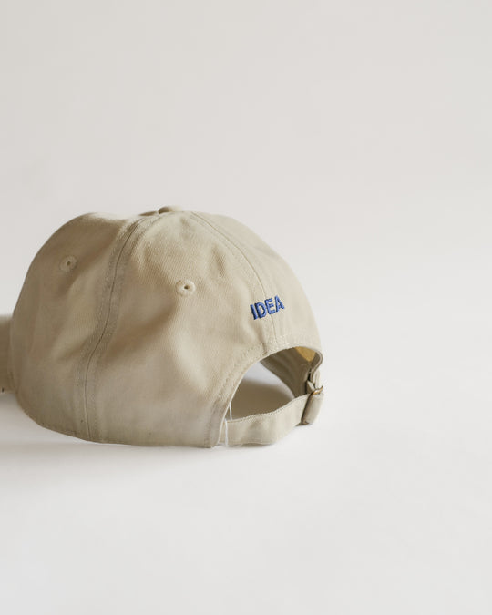IDEA Books Cat To Feed Hat (Beige) — IDEA Books, at SORT Vancouver